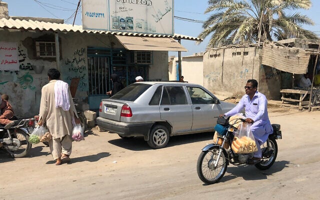 File: A Baluch rides a motorcycle on the outskirts of Chabahar in Iran's southern Sistan-Baluchistan province, on October 4, 2018 (AFP)