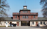 Visitors queue at the main gate of the former Buchenwald Nazi concentration camp memorial site, on April 3, 2025. (JENS SCHLUETER / AFP)