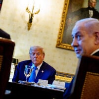 Illustrative: Prime Minister Benjamin Netanyahu answers a question, as US President Donald Trump looks on, during a dinner in the Blue Room of the White House on July 7, 2025. (Andrew Harnik / Getty Images via AFP)