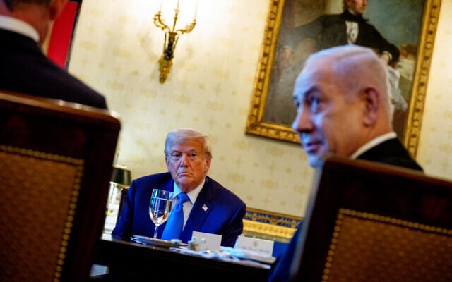 Prime Minister Benjamin Netanyahu answers a question, as US President Donald Trump looks on, during a dinner in the Blue Room of the White House on July 7, 2025. (Andrew Harnik / Getty Images via AFP) Prime Minister Benjamin Netanyahu answers a question, as US President Donald Trump looks on, during a dinner in the Blue Room of the White House on July 7, 2025. (Andrew Harnik / Getty Images via AFP)