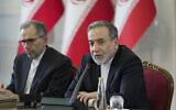 Iranian Foreign Minister Abbas Araghchi (R) meets with ambassadors and diplomatic representatives in Tehran, Iran, on July 12, 2025. (Hamid FOROUTAN / Iran's Ministry of Foreign Affairs / AFP)