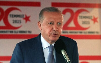 Turkish President Recep Tayyip Erdogan speaks during a military parade commemorating Turkey's 1974 invasion of Cyprus, in the northern part of the island's capital Nicosia on July 20, 2025. (Birol BEBEK / AFP)