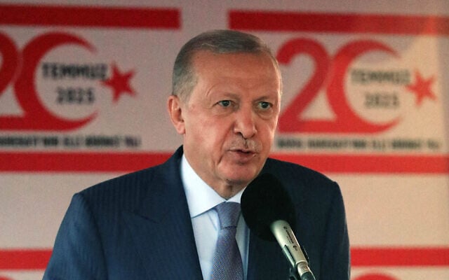 Turkish President Recep Tayyip Erdogan speaks during a military parade commemorating Turkey's 1974 invasion of Cyprus, in the northern part of the island's capital Nicosia on July 20, 2025. (Birol BEBEK / AFP) Turkish President Recep Tayyip Erdogan speaks during a military parade commemorating Turkey's 1974 invasion of Cyprus, in the northern part of the island's capital Nicosia on July 20, 2025. (Birol BEBEK / AFP)