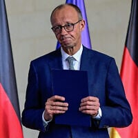 German Chancellor Friedrich Merz leaves after making a statement to journalists following a meeting of the security Cabinet of the German government at the Chancellery in Berlin on July 28, 2025. (John MACDOUGALL / AFP)