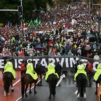 Mounted police keep watch as pro-Palestinian, anti-Israel protesters march towards Sydney's Harbour Bridge during a demonstration on August 3, 2025. (Saeed KHAN / AFP)