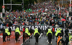 Mounted police keep watch as pro-Palestinian, anti-Israel protesters march towards Sydney's Harbour Bridge during a demonstration on August 3, 2025. (Saeed KHAN / AFP)