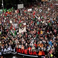 Demonstrators cross the Sydney Harbour Bridge during a rally calling for sanctions against Israel, on August 3, 2025. (Saeed KHAN / AFP)
