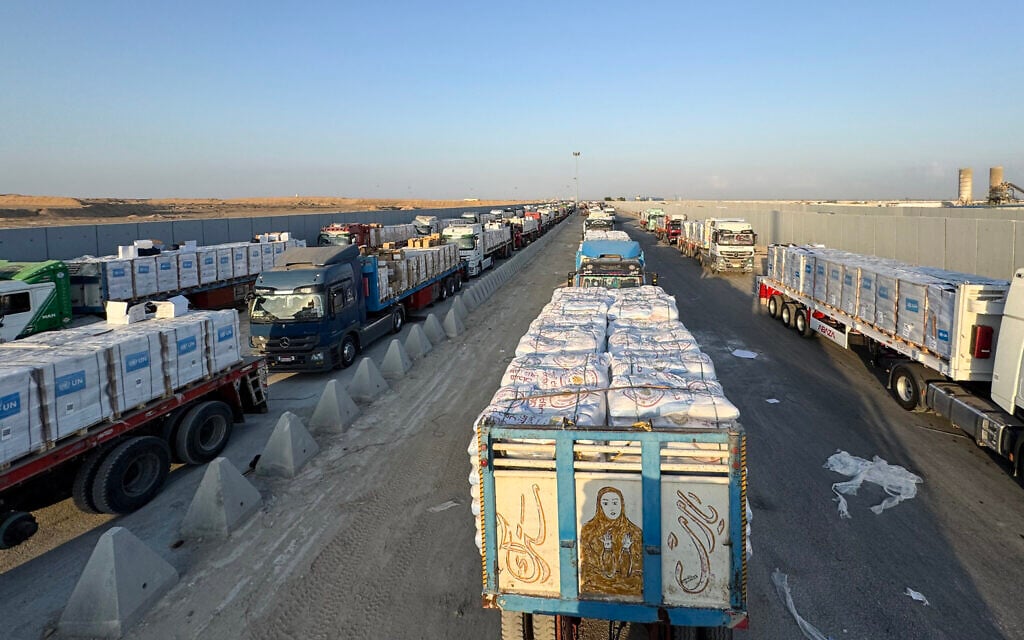 Trucks loaded with humanitarian aid wait on the Egyptian side of the Rafah crossing into the Gaza Strip for permission to enter the territory on August 3, 2025. (AFP) Trucks loaded with humanitarian aid wait on the Egyptian side of the Rafah crossing into the Gaza Strip for permission to enter the territory on August 3, 2025. (AFP)