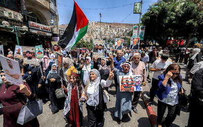 Demonstrators rally in the West Bank city of Nablus in support of Palestinians detained by Israel and against the war in Gaza, August 3, 2025. (JAAFAR ASHTIYEH / AFP)