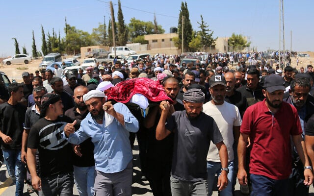 Palestinians attend the funeral of, Awdah Hathaleen, who was killed during an attack by Israeli settlers on July 27, in the village of Umm al-Khair, in the Masafer Yatta area, south of Hebron, in the West Bank on August 7, 2025. (by mosab shawer / AFP) Palestinians attend the funeral of, Awdah Hathaleen, who was killed during an attack by Israeli settlers on July 27, in the village of Umm al-Khair, in the Masafer Yatta area, south of Hebron, in the West Bank on August 7, 2025. (by mosab shawer / AFP)