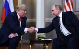 Filre: Russian President Vladimir Putin (R) and US President Donald Trump shake hands before a meeting in Helsinki on July 16, 2018 (Brendan Smialowski / AFP)