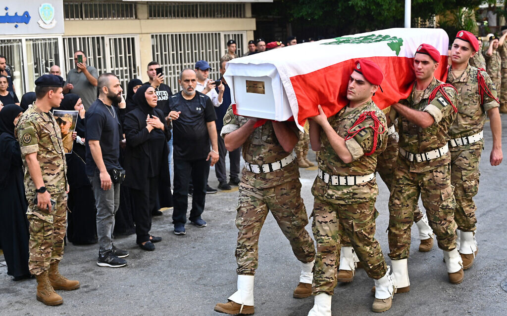 Relatives mourn as the body of Mohammed Ali Shuqair, one of six Lebanese soldiers killed on August 9 while removing munitions from a Hezbollah site in southern Lebanon is taken for burial outside the military hospital in Beirut on August 10, 2025. (Fadel Itani/AFP) Relatives mourn as the body of Mohammed Ali Shuqair, one of six Lebanese soldiers killed on August 9 while removing munitions from a Hezbollah site in southern Lebanon is taken for burial outside the military hospital in Beirut on August 10, 2025. (Fadel Itani/AFP)