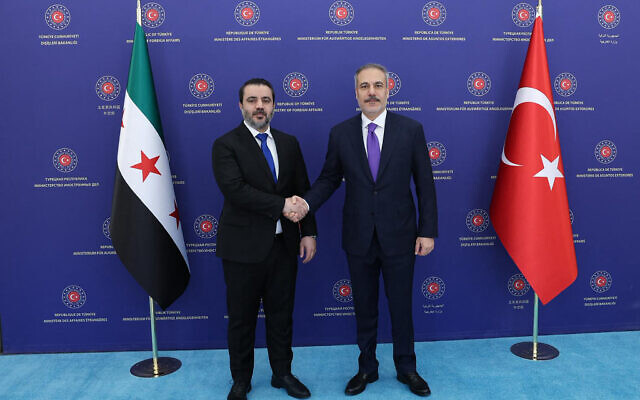 Turkish Foreign Minister Hakan Fidan (R) meeting with Syrian Foreign Minister Asaad al-Shaibani in Ankara on August 13, 2025. (TURKISH FOREIGN MINISTRY / AFP) Turkish Foreign Minister Hakan Fidan (R) meeting with Syrian Foreign Minister Asaad al-Shaibani in Ankara on August 13, 2025. (TURKISH FOREIGN MINISTRY / AFP)