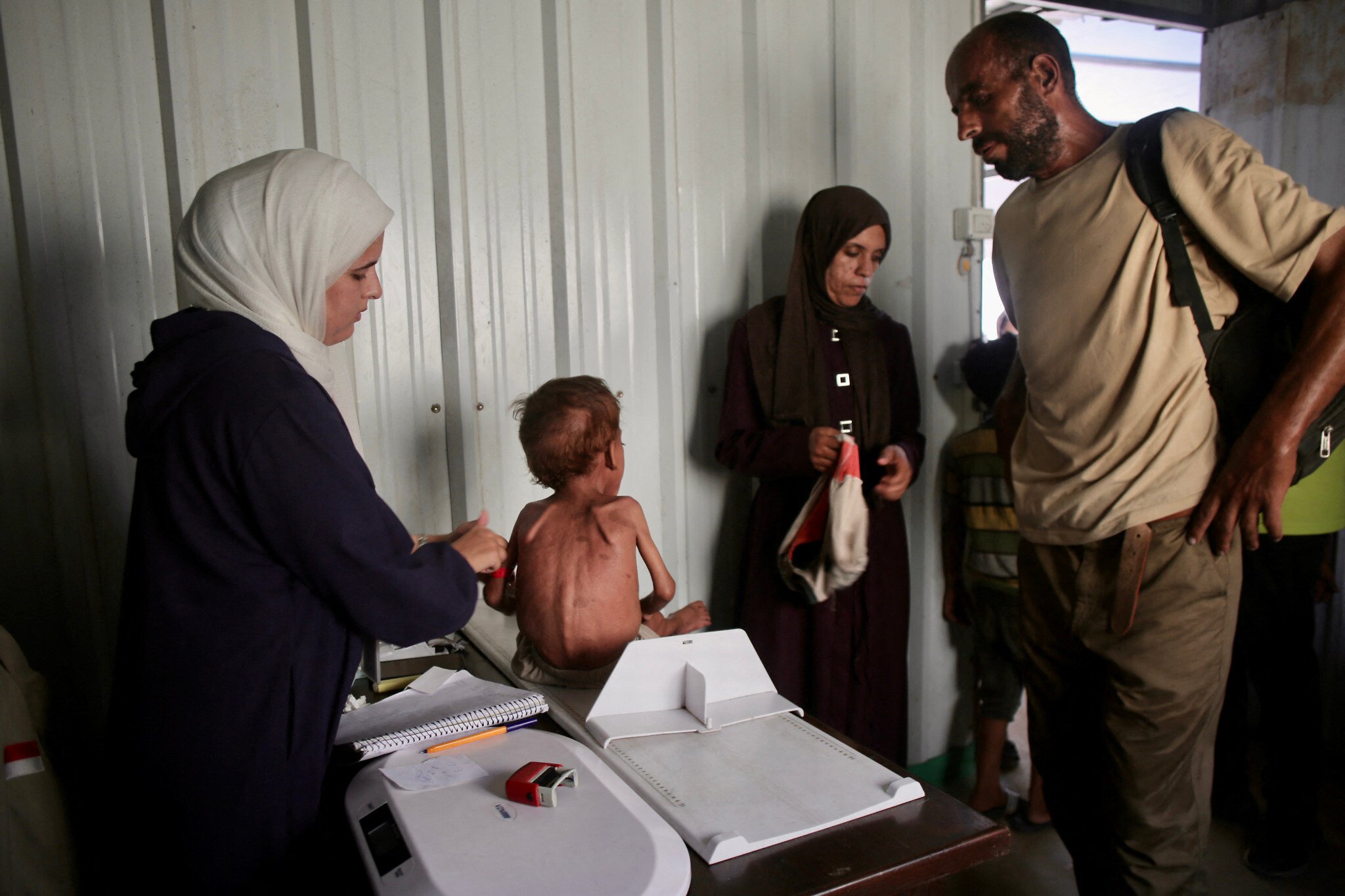 NextImg:UN says 13,000 children treated for malnutrition in Gaza in July as aid trickles in