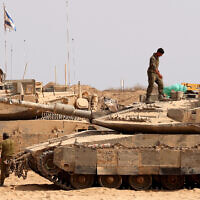 Israeli troops deploy at the border with the Gaza Strip, on August 13, 2025 (Photo by Jack GUEZ / AFP)
