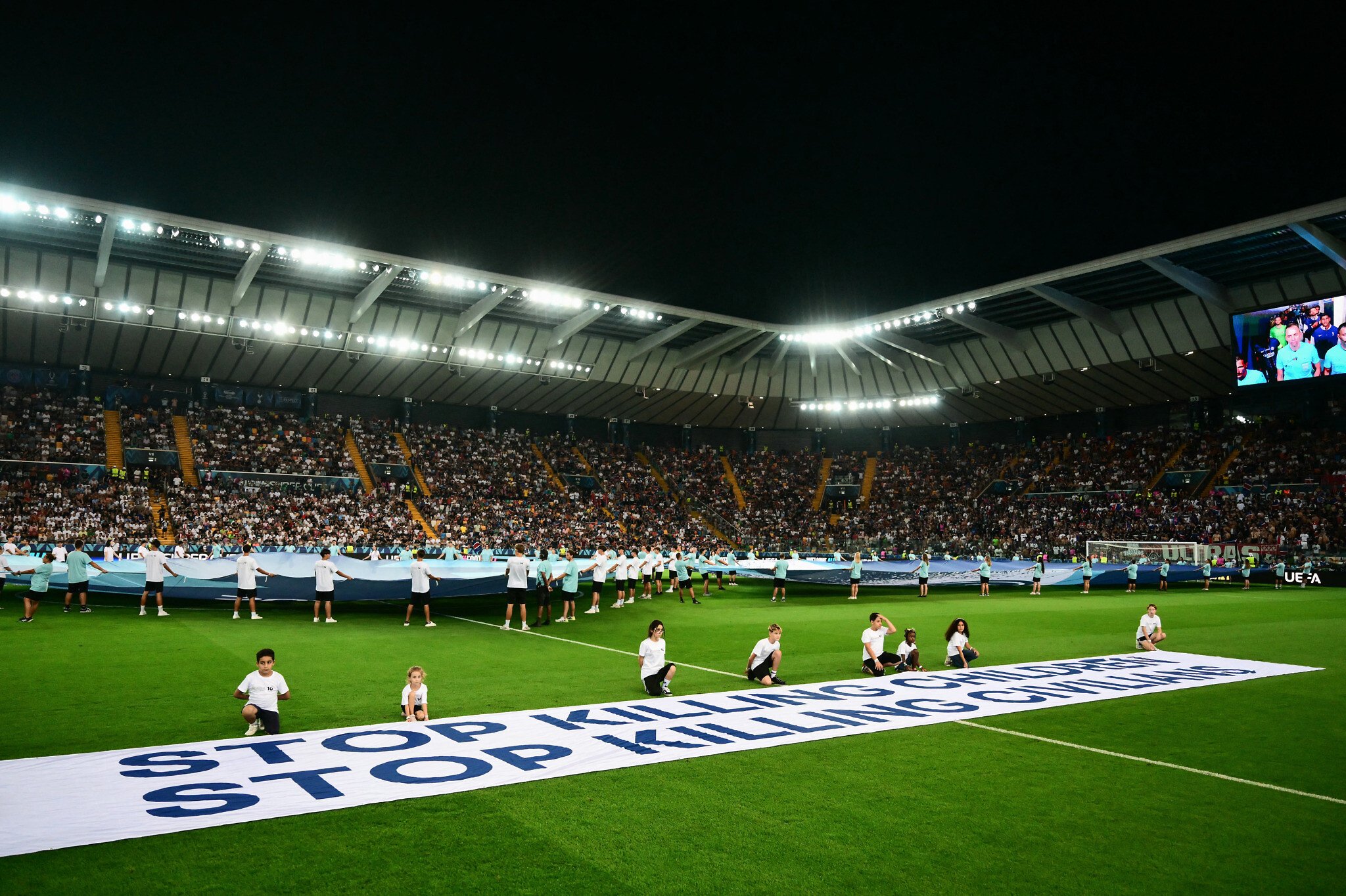 NextImg:Flouting its own rules, UEFA displays ‘stop killing children’ banner at key match