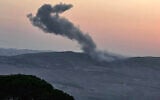 A picture taken from the southern Lebanese village of Marjayoun, shows smoke rising from the site of an Israeli airstrike that targeted the outskirts of the village of Kfartibnit in the district of Nabatieh on August 15, 2025. (Photo by Rabih DAHER / AFP)