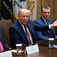 US President Donald Trump speaks during in a cabinet meeting, alongside Secretary of State Marco Rubio (L), Secretary of Defense Pete Hegseth (2R), and Secretary of Commerce Howard Lutnick (R), at the White House in Washington on August 26, 2025. ( Mandel Ngan/AFP)