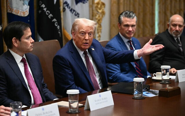 US President Donald Trump speaks during in a cabinet meeting, alongside Secretary of State Marco Rubio (L), Secretary of Defense Pete Hegseth (2R), and Secretary of Commerce Howard Lutnick (R), at the White House in Washington on August 26, 2025. ( Mandel Ngan/AFP)