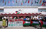 Pro-Palestinian, anti-Israel activists protest ahead of the opening ceremony of the 82nd Venice Film Festival at Venice Lido on August 27, 2025. (Tiziana FABI / AFP)