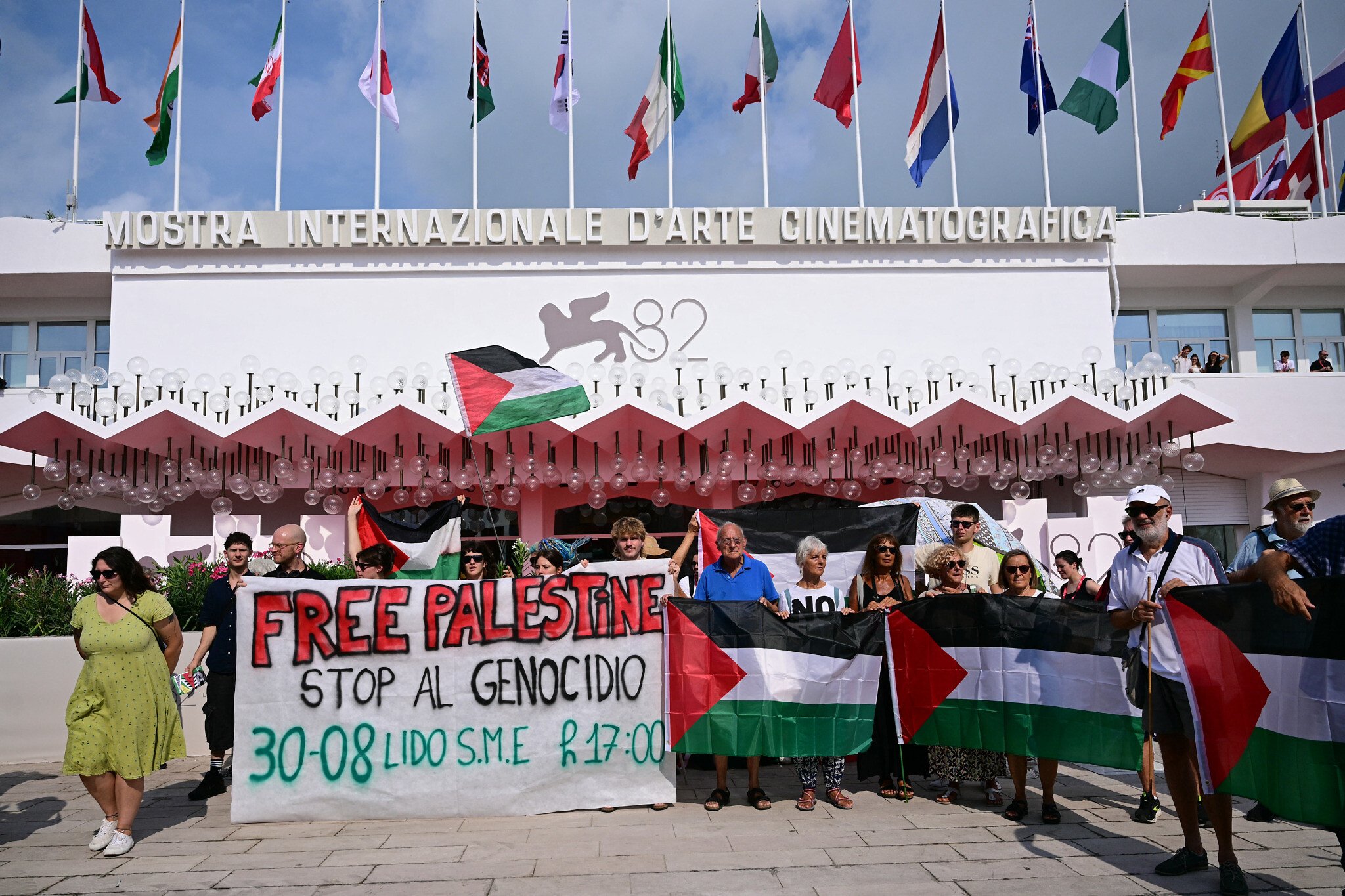 NextImg:Protesters unfurl ‘stop genocide’ banner at start of Venice Film Festival