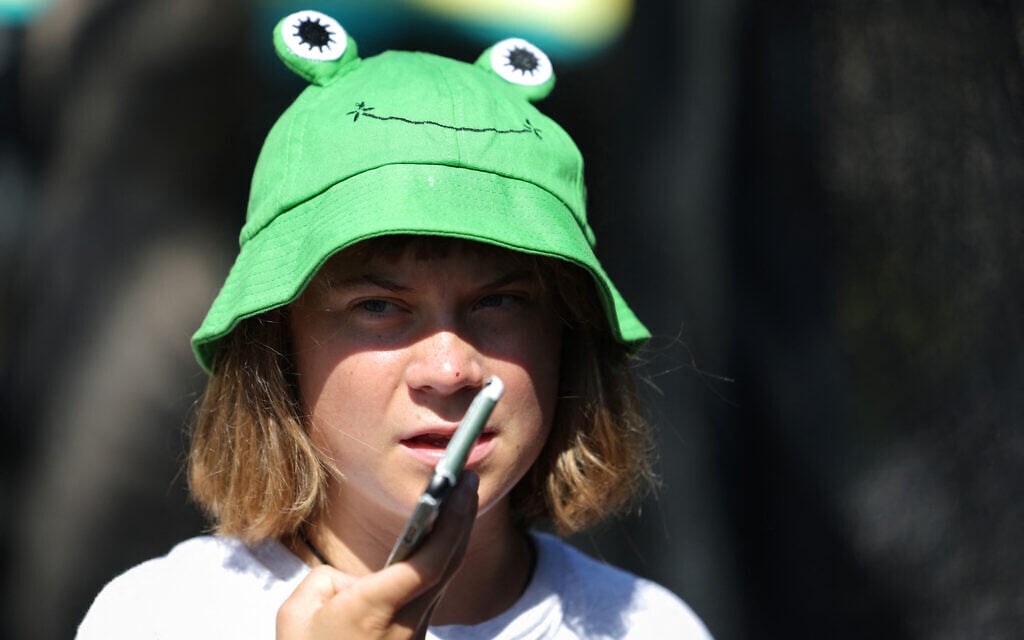 Swedish climate activist Greta Thunberg arrives at the launch of a flotilla aimed at breaking the blockade of the Gaza Strip, in Barcelona, on August 31, 2025 (Lluis GENE / AFP)
