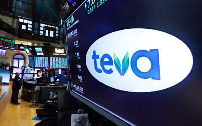 Illustrative: The logo for Teva appears above a trading post on the floor of the New York Stock Exchange, October 21, 2019. (AP Photo/Richard Drew)