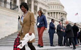 Rep.-elect Valerie Foushee, D-N.C., left, arrives for a class photo of newly-elected members of Congress on the East Front of the Capitol in Washington, Tuesday, Nov. 15, 2022. (AP Photo/Patrick Semansky)