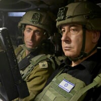 Illustrative: Prime Minister Benjamin Netanyahu sits in a military vehicle in the southern city of Rafah in the Gaza Strip, July 18, 2024. (Avi Ohayon/Israel Prime Minister's Office via AP)