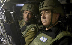 Illustrative: Prime Minister Benjamin Netanyahu sits in a military vehicle in the southern city of Rafah in the Gaza Strip, July 18, 2024. (Avi Ohayon/Israel Prime Minister's Office via AP)