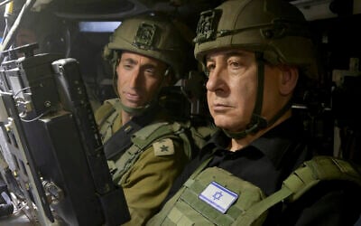 Illustrative: Prime Minister Benjamin Netanyahu sits in a military vehicle in the southern city of Rafah in the Gaza Strip, July 18, 2024. (Avi Ohayon/Israel Prime Minister's Office via AP)