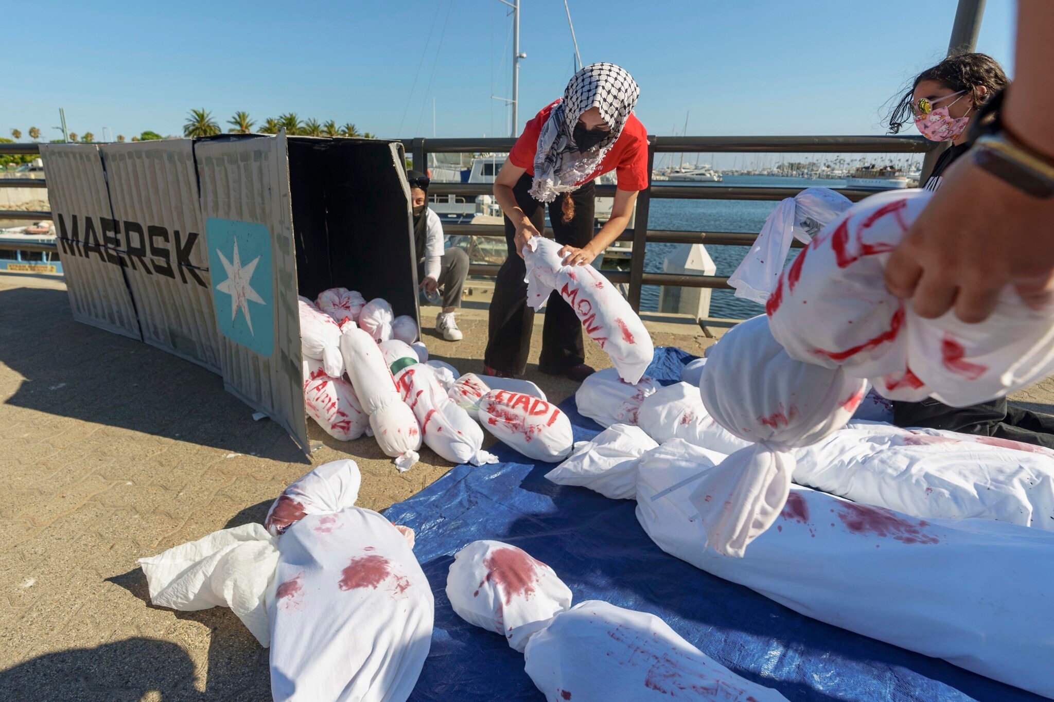NextImg:In Europe, longshoremen organize to keep weapons parts from shipping to Israel