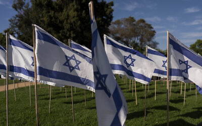Israeli flags honoring the victims of last year's Hamas attack wave in the wind at October 7th Memorial Square in Beverly Hills, California, Oct. 7, 2024. (AP Photo/Jae C. Hong)