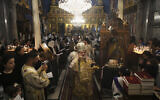 Palestinian Christians attend a Good Friday Mass at the Greek Orthodox Church of Saint Porphyrius in Gaza City on April 18, 2025. (AP Photo/Jehad Alshrafi)