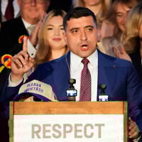 Presidential candidate George Simion speaks to media after polls closed for the second round of the country's presidential election redo in Bucharest, Romania, May 18, 2025. (AP Photo/Vadim Ghirda)