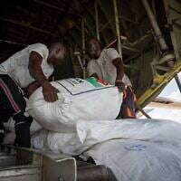 A Fogbow aid plane is loaded at an airport in Juba, South Sudan, on June 9, 2025, before conducting airdrops of food in the Upper Nile region. (AP Photo/ Florence Miettaux)