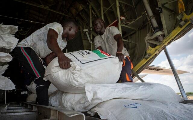 A Fogbow aid plane is loaded at an airport in Juba, South Sudan, on June 9, 2025, before conducting airdrops of food in the Upper Nile region. (AP Photo/ Florence Miettaux)