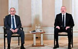 Azerbaijani President Ilham Aliyev, right, and Prime Minister of Armenia Nikol Pashinyan pose for a photo prior to their talks in Abu Dhabi, United Arab Emirates, July 10, 2025. (Azerbaijani Presidential Press Office via AP)