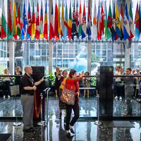 Illustrative: State Department employees applaud as their colleagues walk through the lobby of the State Department headquarters in the Harry S Truman Building, Friday, July 11, 2025, in Washington. (AP Photo/Mark Schiefelbein)