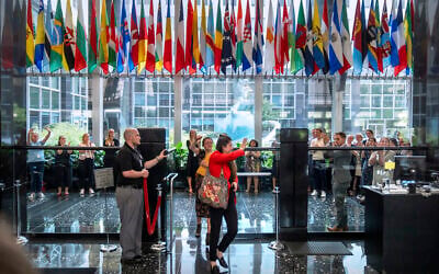 Illustrative: State Department employees applaud as their colleagues walk through the lobby of the State Department headquarters in the Harry S Truman Building, Friday, July 11, 2025, in Washington. (AP Photo/Mark Schiefelbein)