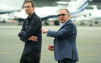 White House special envoy Steve Witkoff, right, and Jared Kushner wait for the arrival of President Donald Trump at Teterboro Airport in Teterboro, N.J. on July 13, 2025. (AP Photo/Jacquelyn Martin)