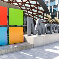 A Microsoft sign and logo are pictured at the company's headquarters, April 4, 2025, in Redmond, Washington. (AP Photo/Jason Redmond, File)