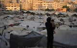 A tent camp for displaced Palestinians stretches along Gaza City, August 3, 2025. (AP/Jehad Alshrafi)