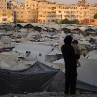 A tent camp for displaced Palestinians stretches along Gaza City, August 3, 2025. (AP Photo/ Jehad Alshrafi)