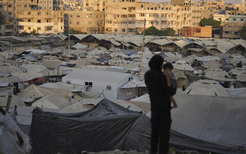 A tent camp for displaced Palestinians stretches along Gaza City, August 3, 2025. (AP Photo/Jehad Alshrafi)