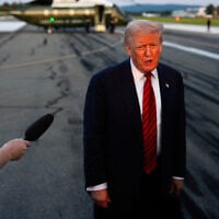 US President Donald Trump speaks with reporters before boarding Air Force One at Lehigh Valley International Airport, August 3, 2025, in Allentown, Pennsylvania. (AP Photo/Julia Demaree Nikhinson)