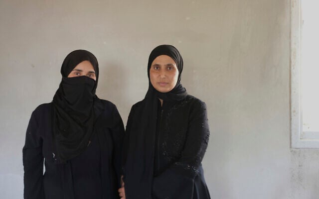 Sara Hathaleen and Myassar Hathaleen, two of dozens of Bedouin women on a hunger strike demanding that Israel return the body of Palestinian activist Awdah Hathaleen, who was killed during a clash with an Israeli settler, are seen in Umm al-Khair, West Bank, August 4, 2025. (AP Photo/Julia Frankel)