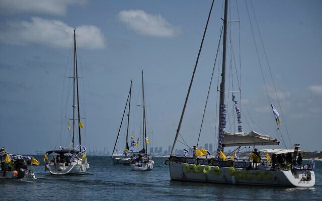 Relatives of Israeli hostages held by Hamas sail off Ashkelon on Thursday, August 7, 2025. (AP/Leo Correa)