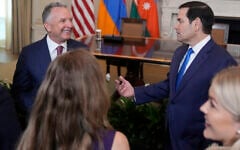 Special Presidential Envoy Steve Witkoff, left, and US Secretary of State Marco Rubio arrive before a trilateral signing ceremony with Azerbaijan's President Ilham Aliyev and Armenia's Prime Minister Nikol Pashinyan in the State Dining Room of the White House, Friday, Aug. 8, 2025, in Washington. (AP Photo/Mark Schiefelbein)