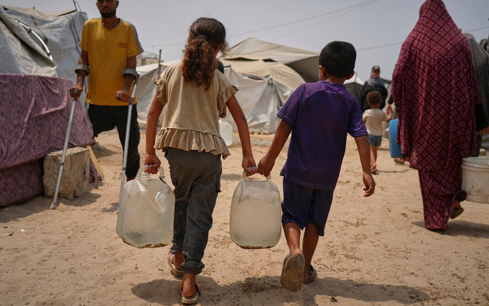 NextImg:Some Gazan families turn to drinking unclean water as they battle heat, thirst